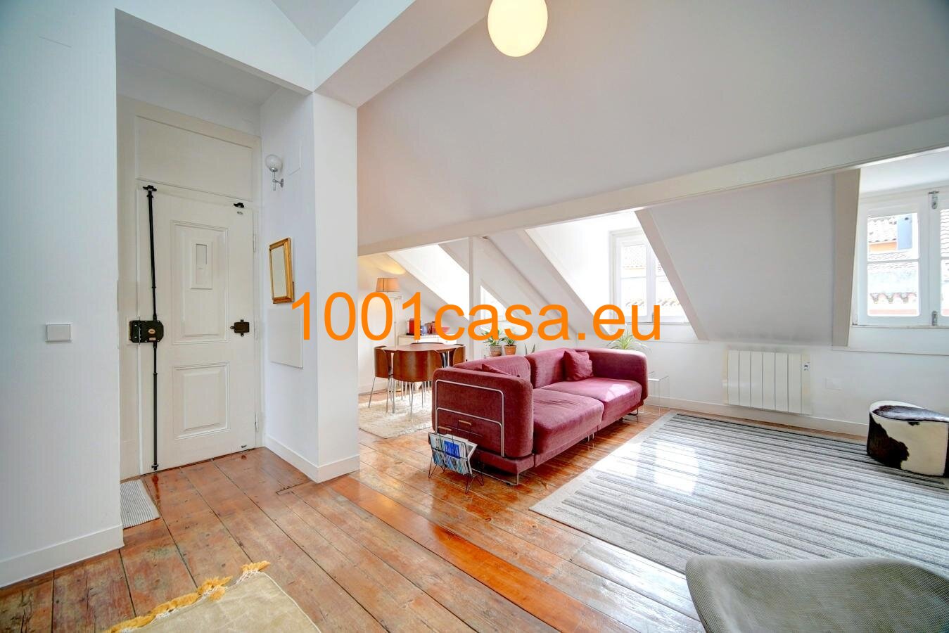 Exklusive DG Wohnung über den Dächern von Lissabon – Design-Juwel im historischen Herzen